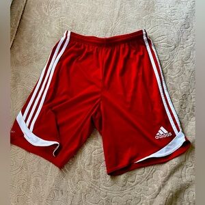 Adidas red shorts.